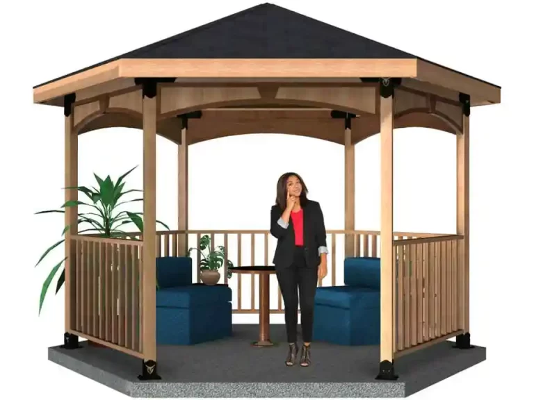 A woman relaxes in a hexagon gazebo, accompanied by a table and chairs, creating a peaceful atmosphere.