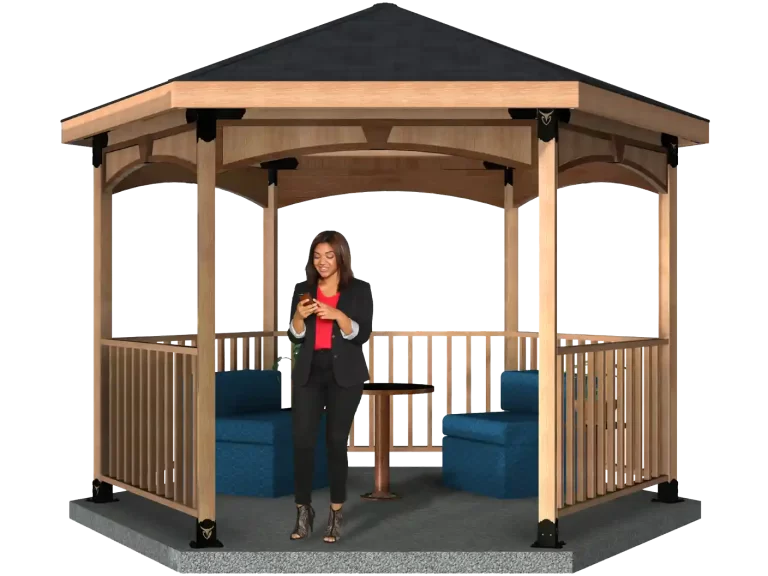 A woman relaxes in a hexagon gazebo, accompanied by a table and chairs, creating a peaceful atmosphere.