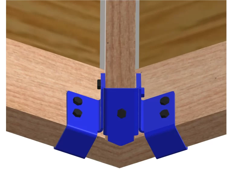 a metallic bracket is securely fastened to a wooden beam, providing sturdy support in a construction workshop environment, demonstrating functional design.