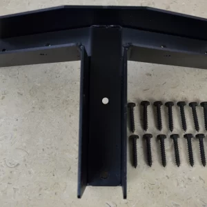DSC_0023 5-12 Pitch Gable End Truss Rafter Bracket made of black metal with a central hole, displayed on a beige surface. Twelve black screws are neatly arranged in three rows to the right of the bracket.