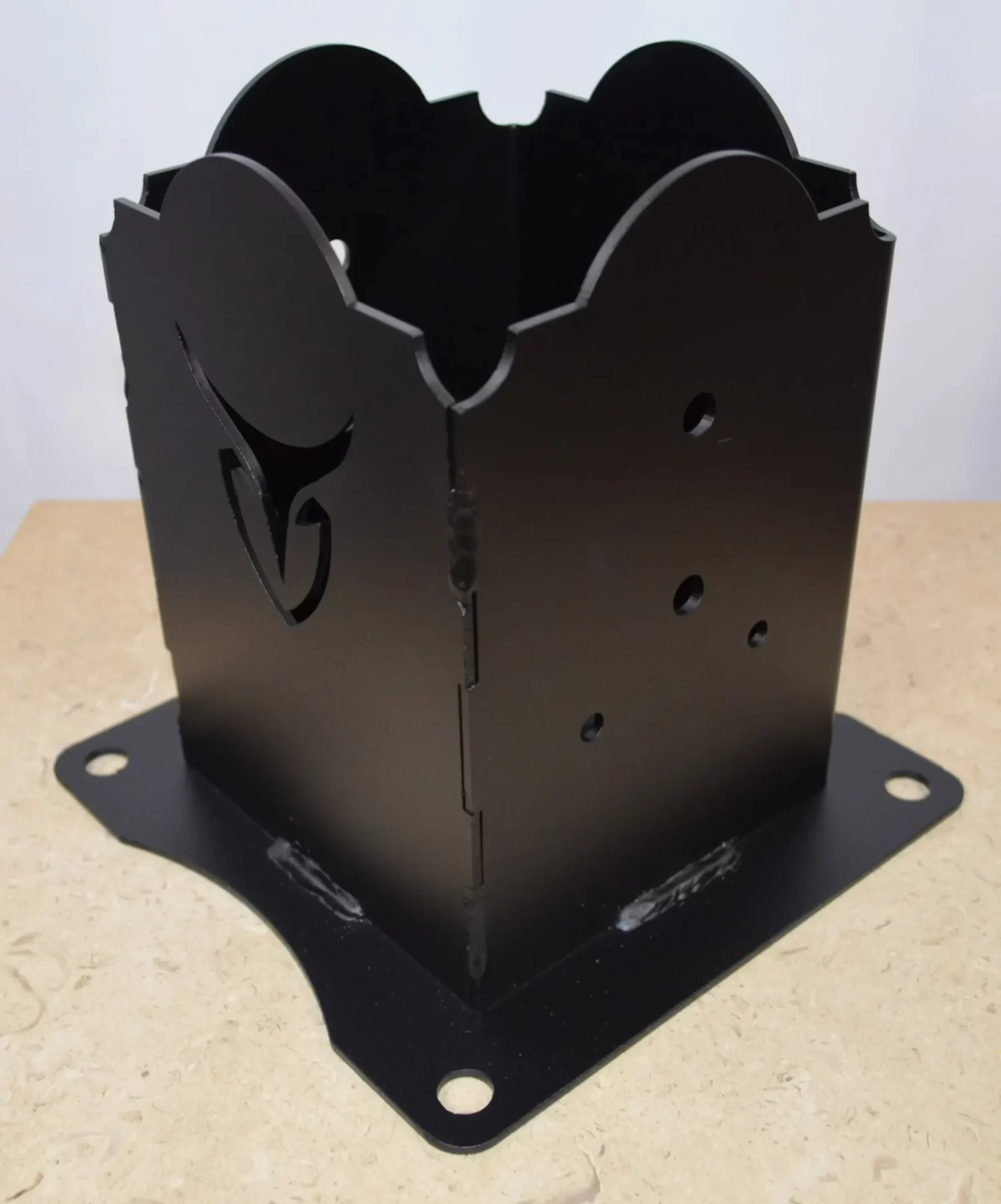 This anchor bracket features a sleek black design with distinct cutouts. Ideal for enhancing construction aesthetics.