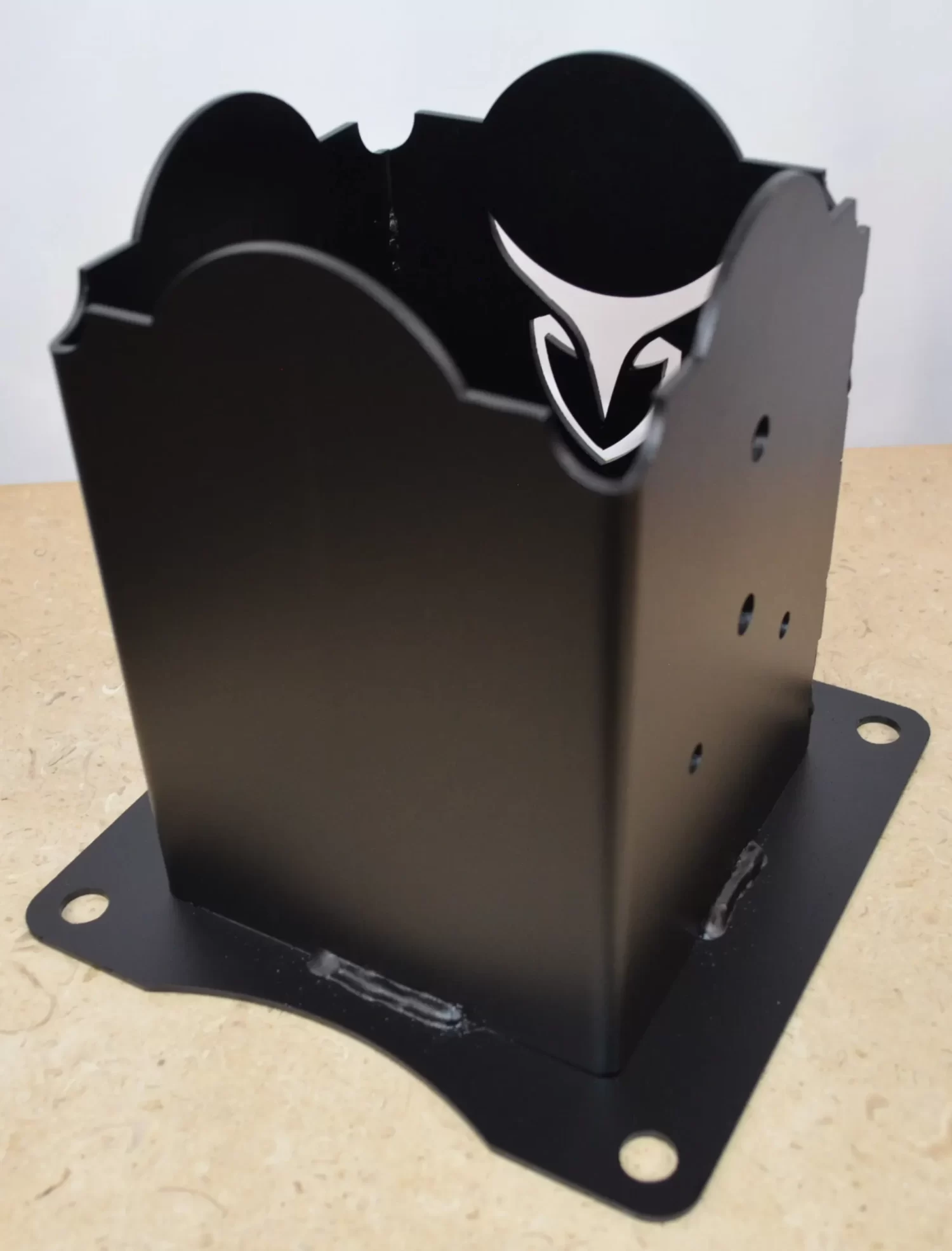 This anchor bracket features a sleek black design with distinct cutouts. Ideal for enhancing construction aesthetics.