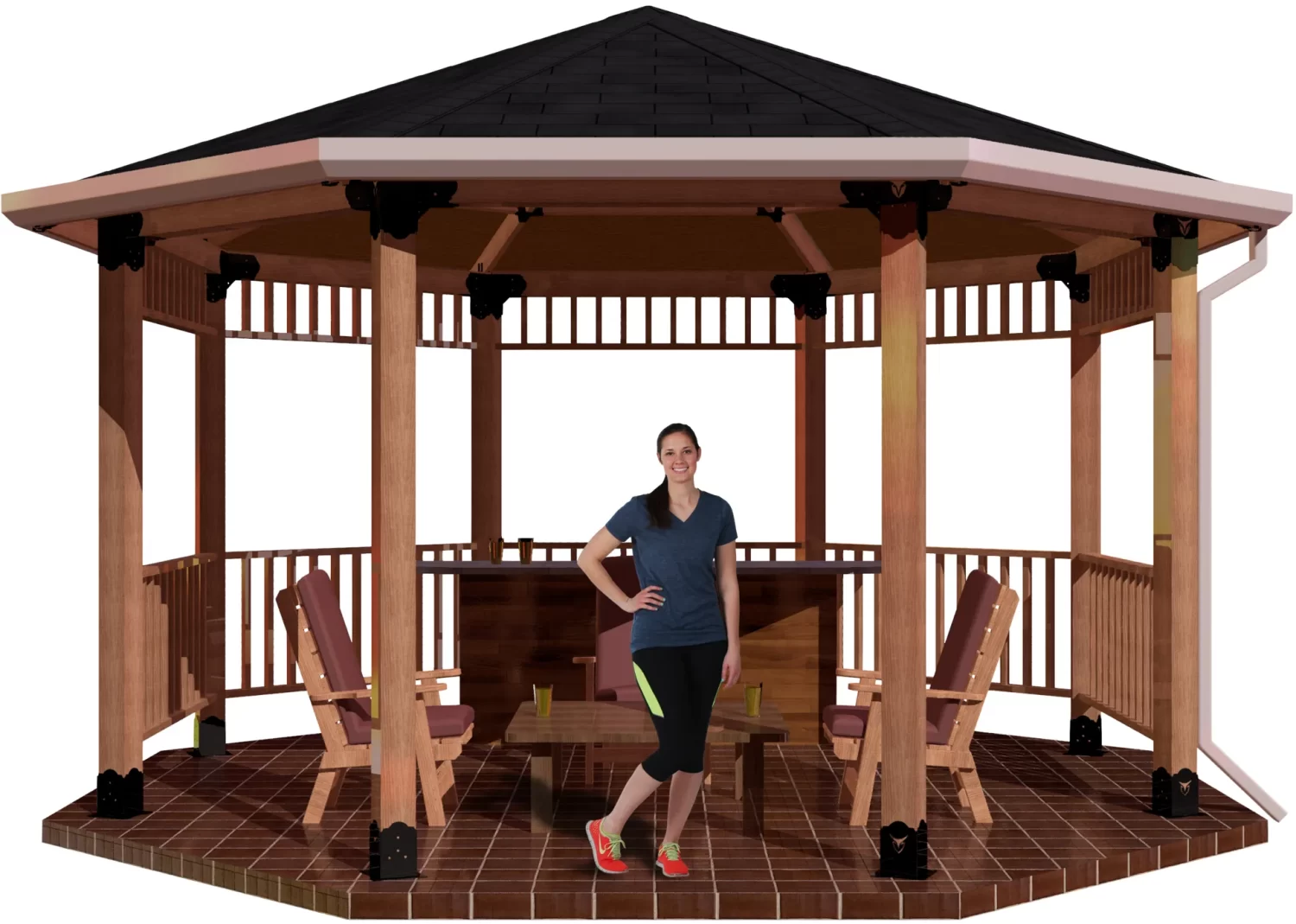 A woman smiles inside a spacious DIY Octagon Gazebo Kit - 6x6 Surface Mounted, featuring a shingled roof, with chairs and a table arranged on the tiled floor.